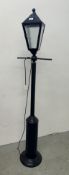 A MODERN METAL CRAFT FLOOR LAMP IN THE FORM OF A VINTAGE STREET LAMP (CABLE REMOVED) - SOLD AS SEEN.