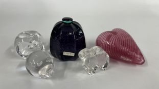 A KOSTA BODA PINK ART GLASS HEART AND A PURPLE KOSTA BODA PAPERWEIGHT,