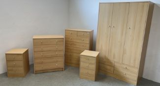 A SUITE OF MODERN LIGHT BEECH FINISH BEDROOM FURNITURE COMPRISING OF TRIPLE WARDROBE WITH DRAWERS