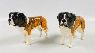 TWO BESWICK PORCELAIN ST. BERNARD DOG STUDIES MARKED CH CORNA-GARTH STROLLER.