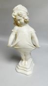 A WHITE PLASTER STATUE OF A YOUNG GIRL IN A SHY POSE, HEIGHT 58CM.