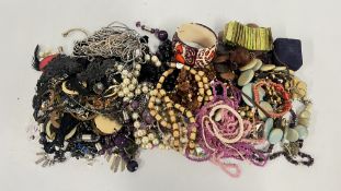 TWO TRAYS OF ASSORTED COSTUME JEWELLERY TO INCLUDE BEADED AND HARD STONE EXAMPLES, FASHION BANGLES,