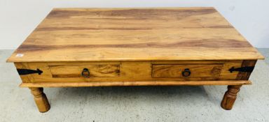 A LARGE HARDWOOD AND METAL DETAILED TWO DRAWER COFFEE TABLE, W 136CM X D 75CM X H 45CM.