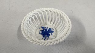 A HEREND HUNGARY HAND PAINTED PORCELAIN OPEN WEAVE BASKET FEATURING A BLUE FLORAL CENTRE 7373-0