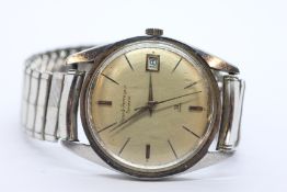 A GENTLEMAN'S GIRARD PERREGAUX STEEL CASED WRIST WATCH WITH 39 JEWEL MOVEMENT ON EXPANDABLE