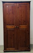 A MODERN HONEY PINE DOUBLE WARDROBE, W 104CM X D 61CM X H 187CM.