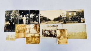 A SMALL GROUP OF ANTIQUE PHOTOGRAPHS TO INCLUDE SHOP FRONT AND INTERIORS AND STREET SCENES.