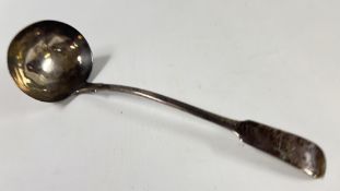 A GEORGE III SILVER FIDDLE PATTERN LADLE, ENGRAVED WITH A CREST.