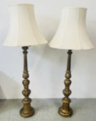 A PAIR OF GILT FINISH CARVED WOODEN LAMP STANDARDS, HEIGHT OF BASES 103CM,