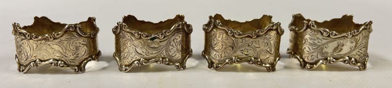 FOUR SILVER NAPKIN RINGS, BIRMINGHAM ASSAY.
