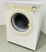 A ZANUSSI COMPACT TUMBLE DRYER - SOLD AS SEEN.
