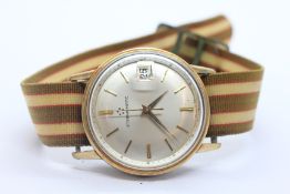 A GENTLEMAN'S VINTAGE ETEMA-MATIC STEEL CASED WRIST WATCH, THE SILVER TONE DIAL WITH DATE APERTURE.