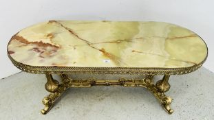AN ONYX TOPPED COFFEE TABLE WITH GILT METAL FRAME.