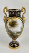 A ROYAL WORCESTER VASE RDN 466194 2401 ON A BLUE GROUND WITH GILDED DETAIL,