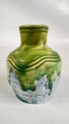 A VINTAGE STUDIO POTTERY GLAZED VASE WITH A BULBOUS BODY AND FLARED NECK BEARING MAKERS MARK