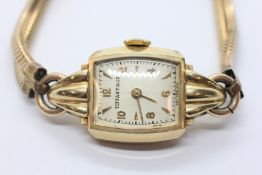 A LADIES TIFFANY & Co VINTAGE 14CT GOLD CASED COCKTAIL WATCH WITH MOVADO 17 JEWEL MANUAL MOVEMENT