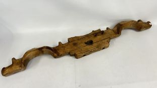 AN ANTIQUE HARD WOOD OX YOLK.