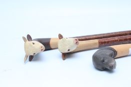 THREE SHOOTING / WALKING STICKS WITH HANDCRAFTED HEADS TO INCLUDE COWS AND DOG,