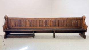PITCH PINE ANTIQUE DOUBLE ENDED CHURCH PEW - LENGTH APPROX 3.8M.