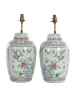 A PAIR OF 19TH CENTURY CHINESE FAMILLE ROSE PORCELAIN JARS AND COVERS CONVERTED TO TABLE LAMPS
