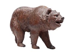 A LATE 19TH CENTURY CARVED BLACK FOREST BEAR