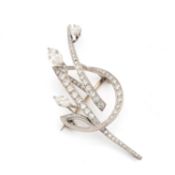 A CARTIER DIAMOND PLATINUM AND WHITE GOLD BROOCH