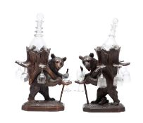 A PAIR OF 19TH CENTURY BLACK FOREST LIQUER CELLARS