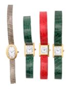 FOUR CARTIER GOLD PLATED DISPLAY WRIST WATCHES