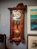 Walnut Cased Vienna wall clock with roman numeral dial