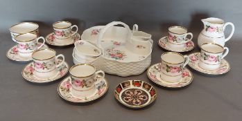 A Coalport Strawberry set together with seven Royal Worcester coffee cups and saucers with cream jug