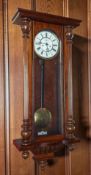 A Vienna type wall clock , the enamel dial with two train movement