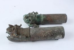 A PAIR OF 18TH CENTURY MUGHAL INDIAN YALI SHAPED BRONZE PALANQUIN FINIALS. 26cms long.