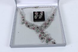 A SILVER SAPPHIRE, EMERALD AND RUBY NECKLACE AND EARRING SET.