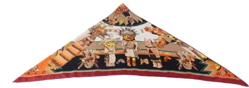 A HERMESE TRIANGULAR SHAPED HEADSCARF, printed with South American figures. 200cms x 90cms.