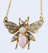 A SILVER AND GOLD PLATED BUTTERFLY NECKLACE.
