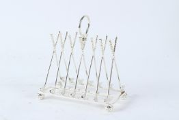 A PLATED TOAST RACK OF GOLF CLUB DESIGN. 16cms wide.