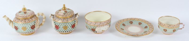 GEORGE OWEN FOR ROYAL WORCESTER, a reticulated part tea service of Japanesque design, comprising