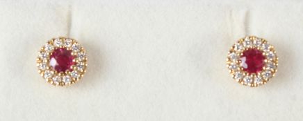 A PAIR OF 18CT YELLOW GOLD, RUBY AND DIAMOND STUD EARRINGS.