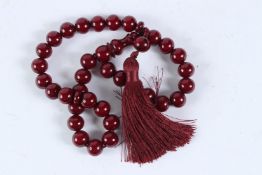CHERRY AMBER COLOURED BEADS.