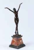 AFTER CHIPARUS. An Art Deco style bronze figure of a dancer, on a square marble base. 56cms high.