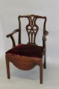 A GEORGE III MAHOGANY ARMCHAIR, with pierced back splat, drop-in seat, on stretchered square legs.