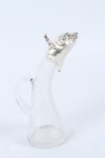 A SMALL GLASS CLARET JUG WITH PLATED MOUNT, modelled as a fish head. 25cms high.