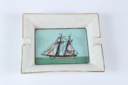 A HERMES PORCELAIN ASHTRAY, decorated with a sailing ship. 19cms x 15.5cms.