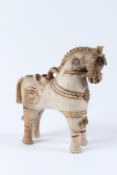 A TERRACOTTA POTTERY MODEL OF A HORSE, possible Peruvian, with whitewashed body and slip glazed