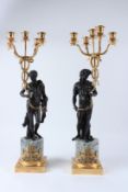 A GOOD PAIR OF BRONZE, GILT BRONZE AND MARBLE FOUR BRANCH, FIVE LIGHT CANDELABRA, modelled as