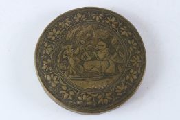 A 19TH CENTURY SOUTH INDIAN ENGRAVED BRASS BOX. 16cms diameter.