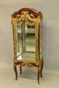 A FRENCH STYLE ORMOLU MOUNTED MAHOGANY VITRINE, with a single door enclosing two glass shelves on