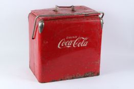 A VINTAGE COCA COLA STORAGE / TRAVELLING BOX. 44cms wide x 43cms high.
