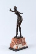 AFTER CHIPARUS. An Art Deco style bronze figure of a dancer, on a rectangular stepped marble base.