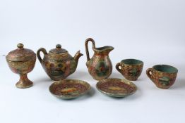 A VERY UNUSUAL 19TH - 20TH CENTURY INDIAN KASHMIRI PAINTED PAPIER MACHE TEA SET. Teapot 14cms high.